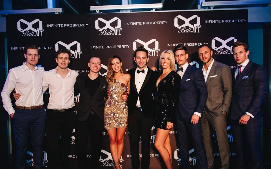 Lewis with the Infinite Prosperity team at the 2016 Ball