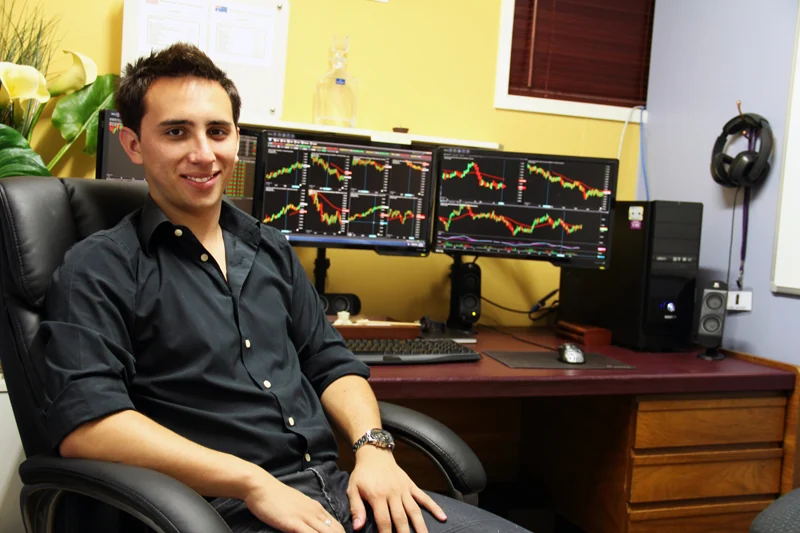 Lewis at his trading desk after quitting to trade full time
